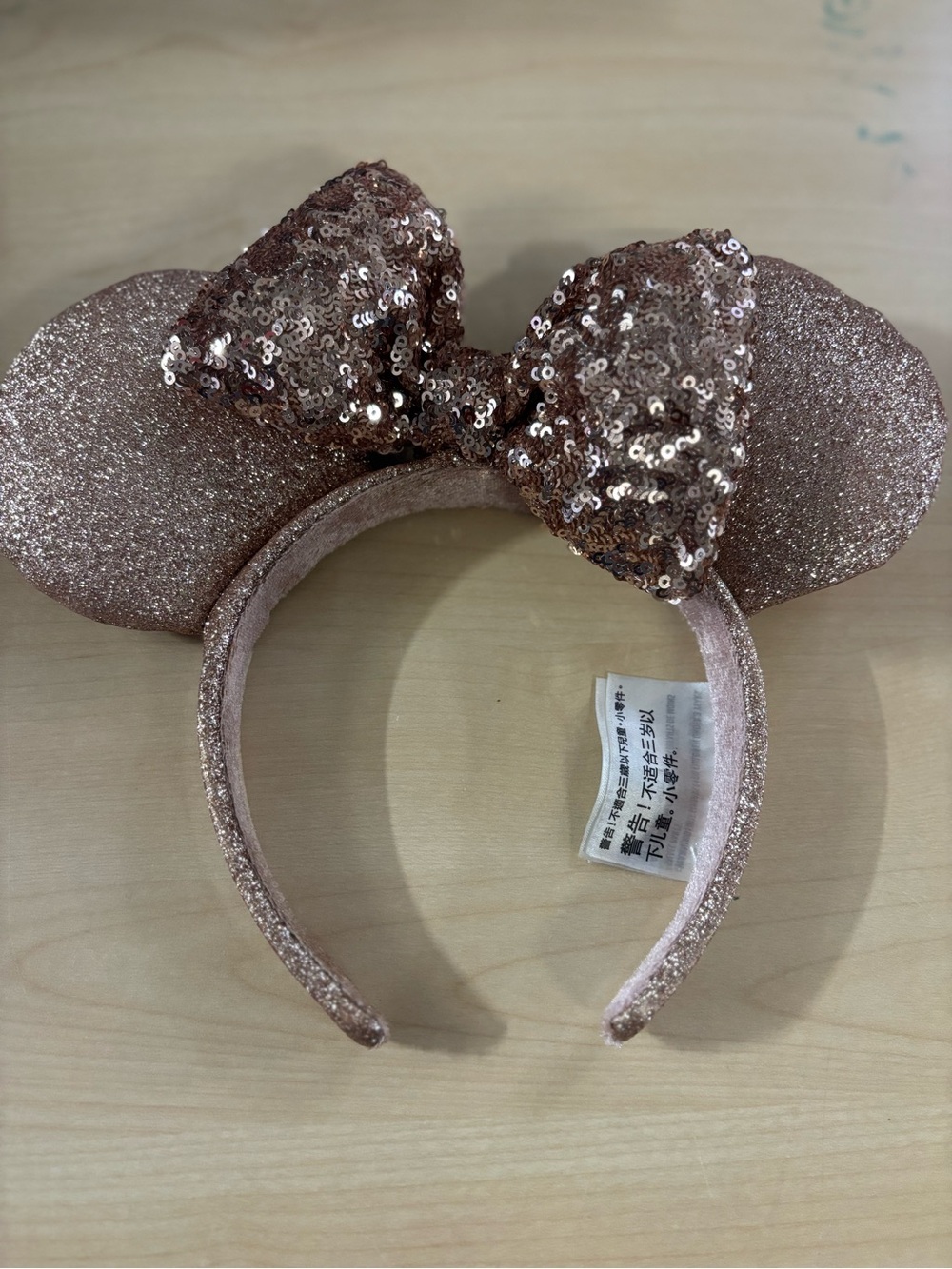 Disney Rose Gold Sequin Minnie Mouse Ears Headband
With small stain